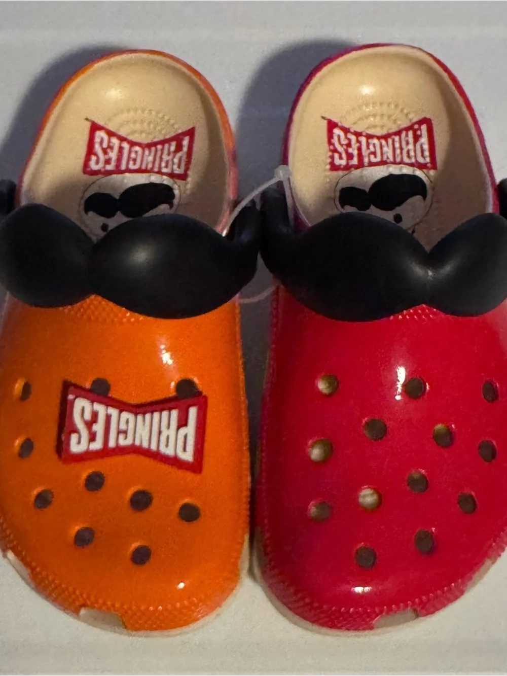 Pringles Crocs Orange and Red Sandals with Black Moustache